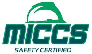 A green and white logo for the national safety certified school.